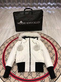 Moose Knuckles White Long Down Parka with White Fur Trim and Pom-Pom Detail