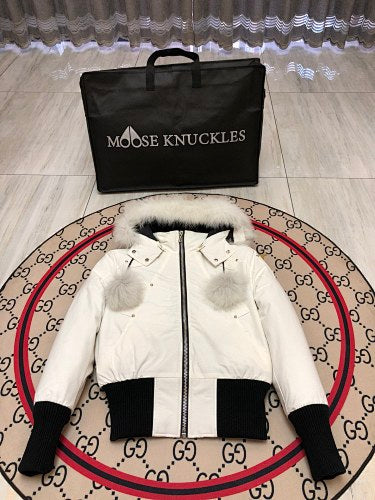 Moose Knuckles White Long Down Parka with White Fur Trim and Pom-Pom Detail